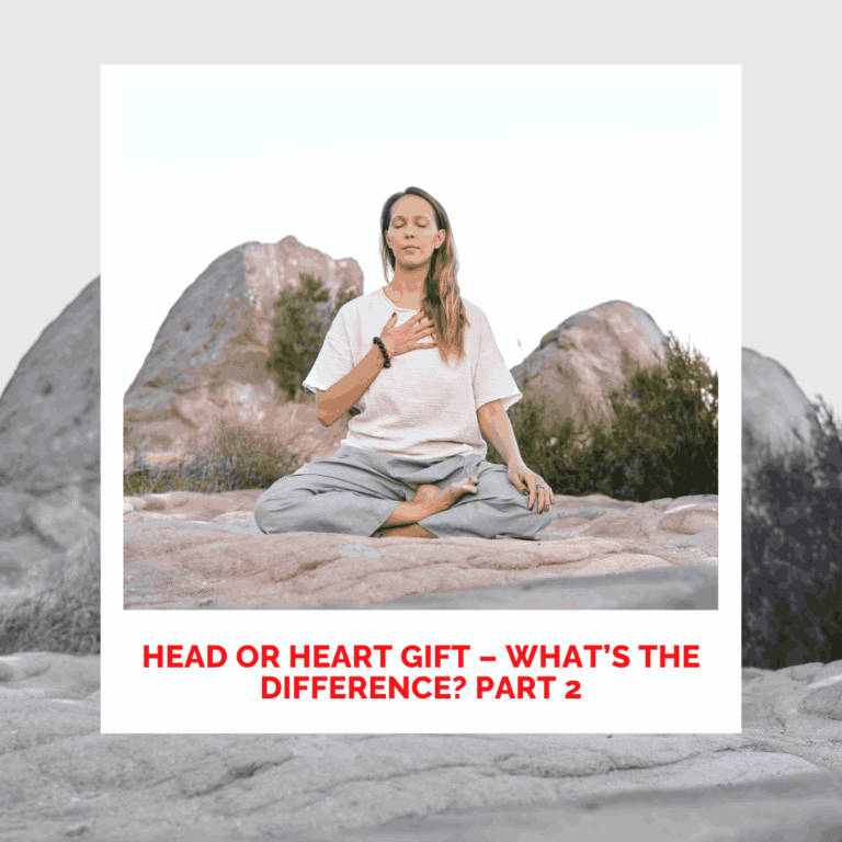 Woman meditating outdoors on rocks for healing and mindfulness practice.