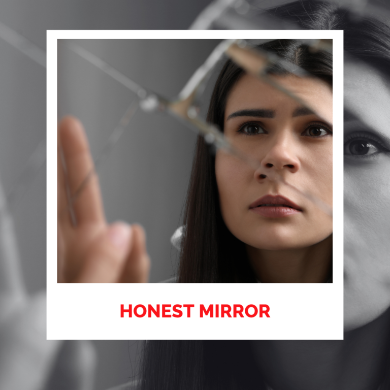 Woman looking into a mirror with a serious expression, reflecting self-awareness.