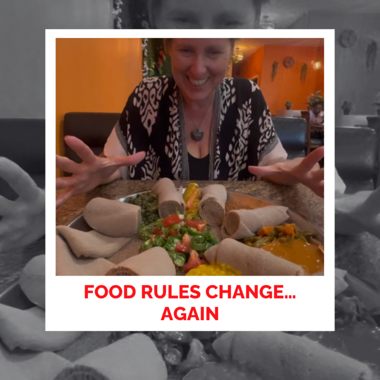 Woman enjoying healthy food with a joyful expression at a restaurant.