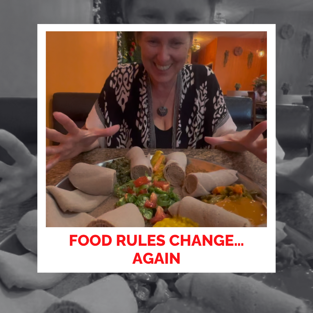 Woman enjoying healthy food with a joyful expression at a restaurant.