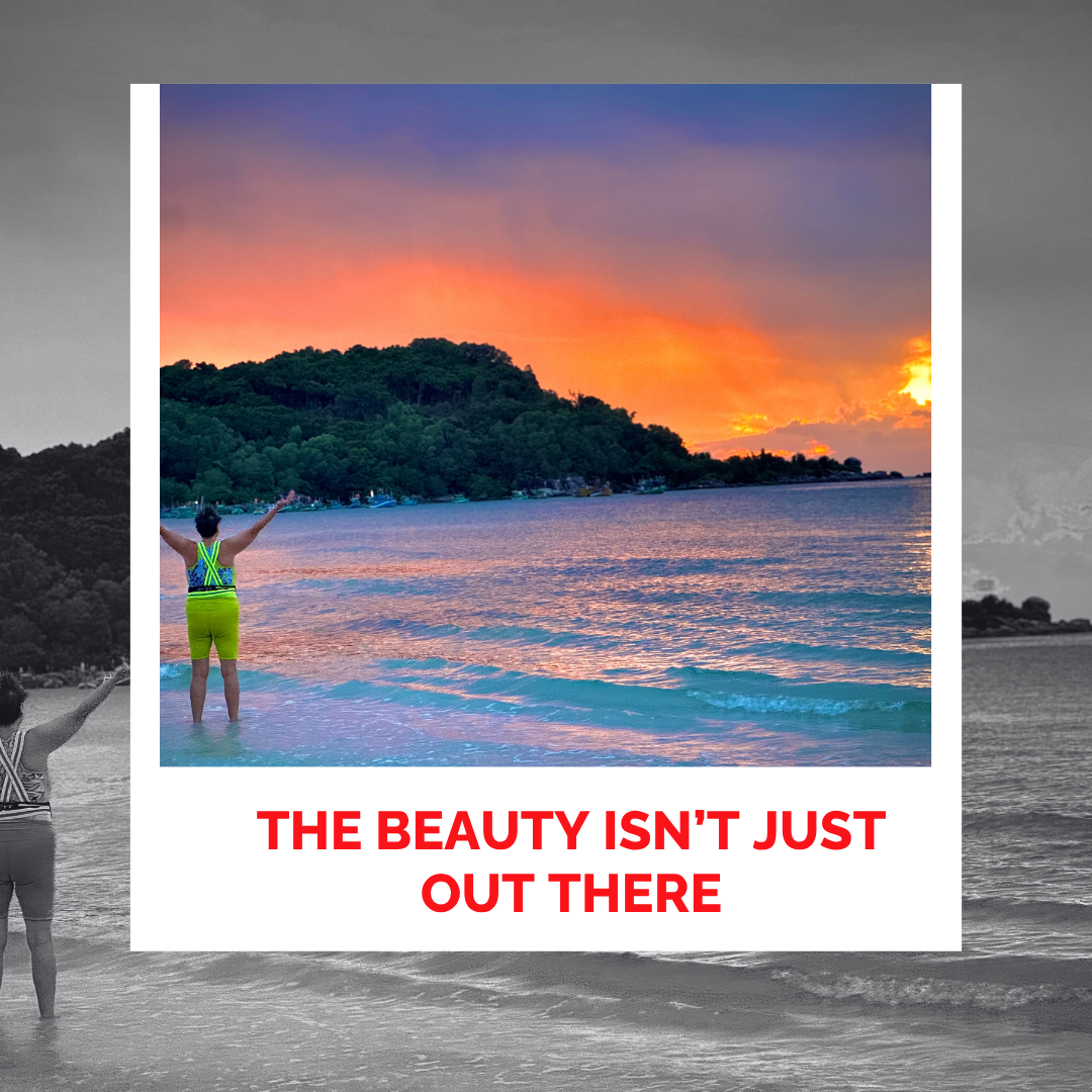 Laura Foster enjoying sunrise at tropical beach for healing and relaxation.