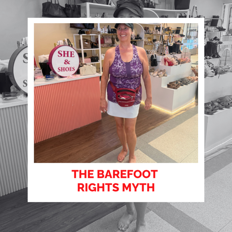 Laura Foster standing barefoot in a shoe store with a sign about shoes.