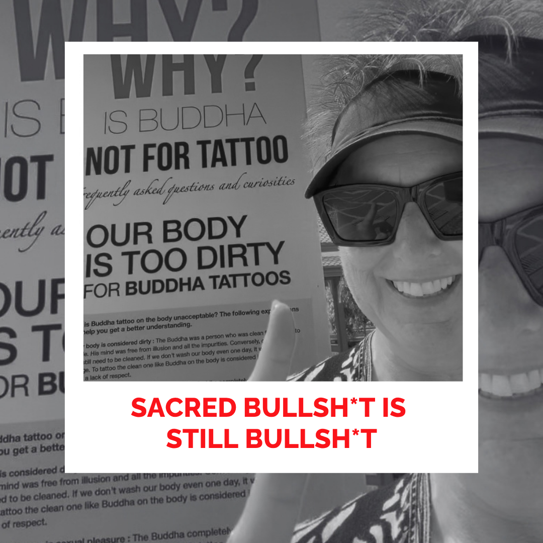 Laura Foster with a sign about Buddha tattoos in the background.